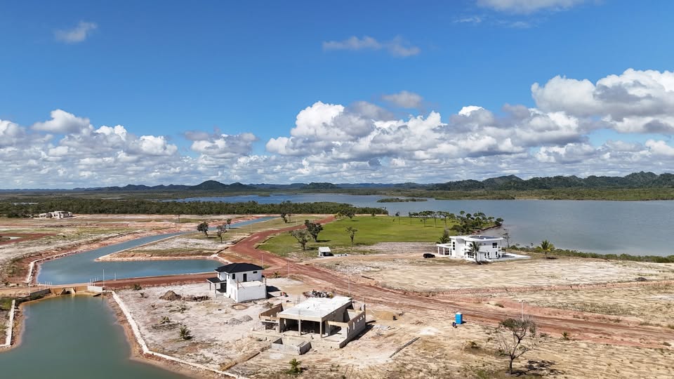 Aerial View of a Large Construction Project Near Water