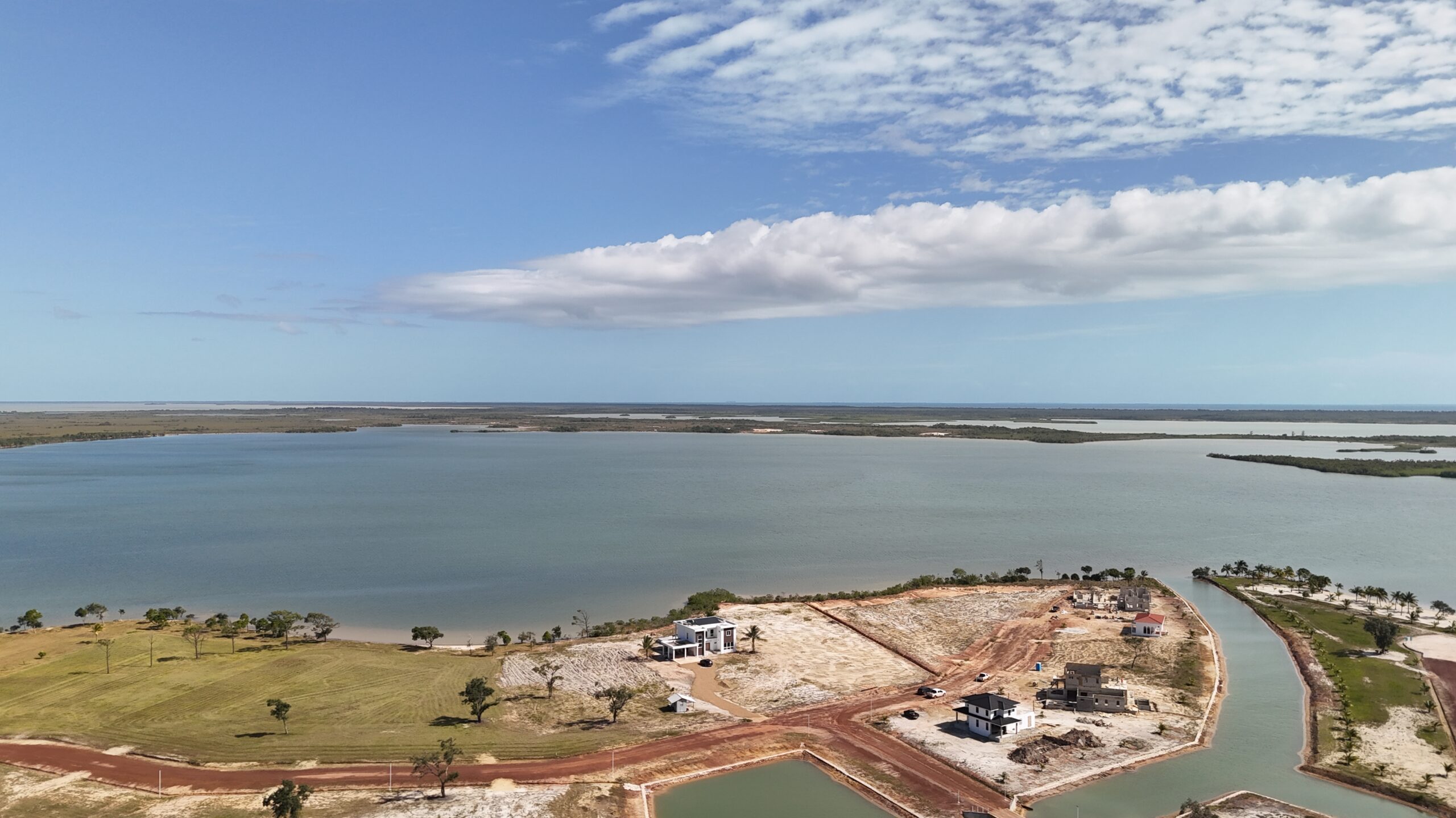Aerial View of a Construction with Water and Land Development